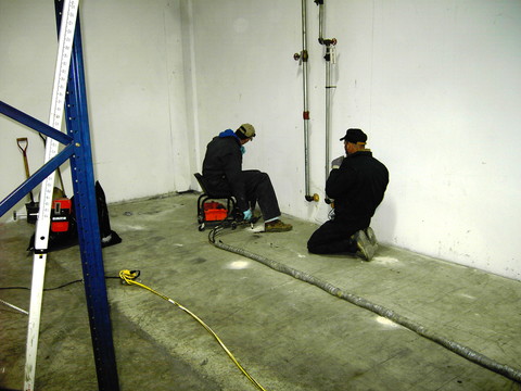 DURING foundation settlement, warehouse, tilt wall, polyurethane foam lifitng