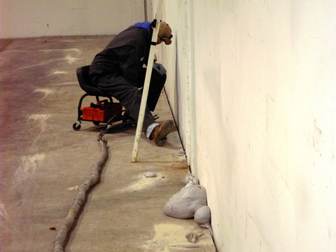 DURING foundation settlement, warehouse, tilt wall, polyurethane foam lifitng